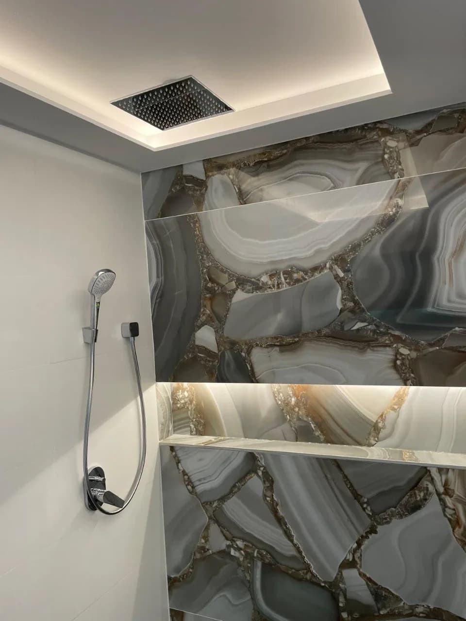 Luxury bathroom plastering with agate feature wall and integrated LED ceiling lighting, Mosman