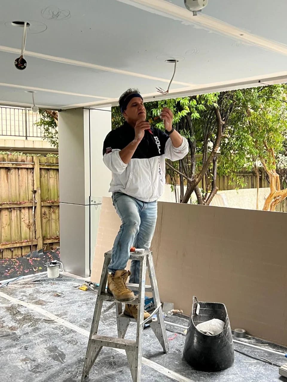 Outdoor patio ceiling water-damage repair in Sydney β gyprock reinstalled under timber framing